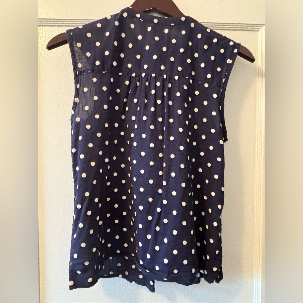 Like new, worn once, XS old navy blue with white spots.